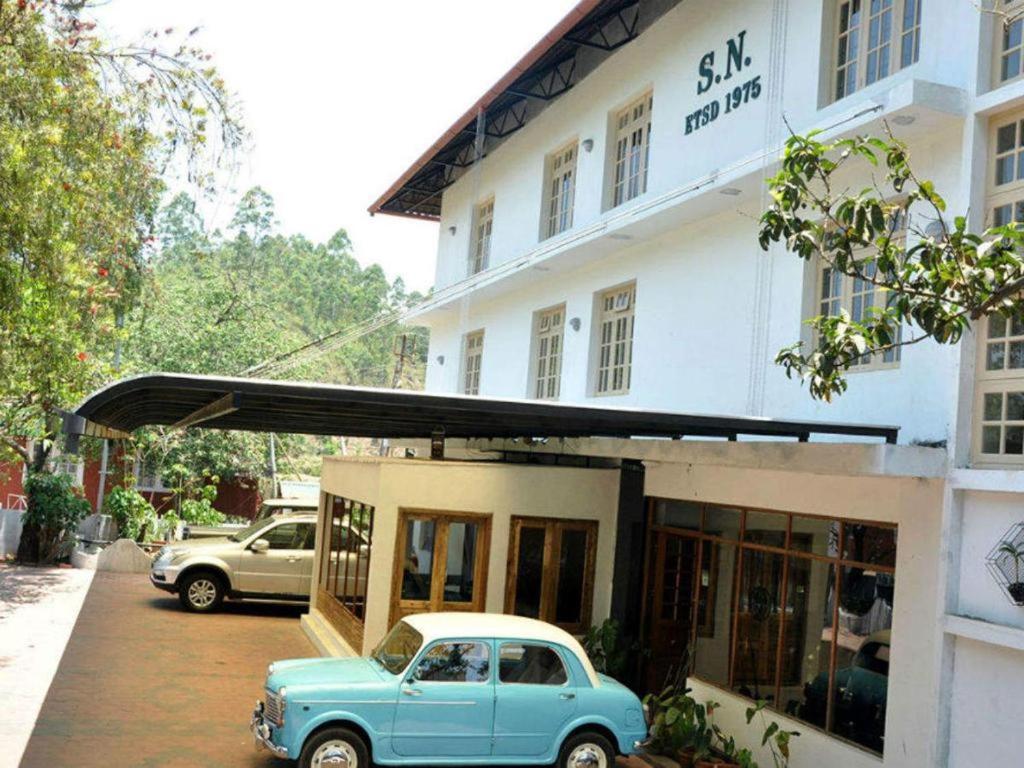 Hotel Sn Munnar Bagian luar foto